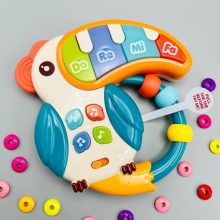Aranyos, Tukán Alakú Zenélő Oktatójáték Színes Zongora Billentyűkkel Babáknak